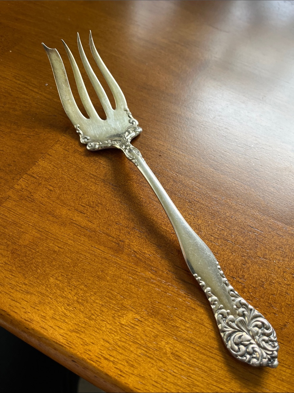 Ornate Silver-Tone Serving Fork with Floral Handle